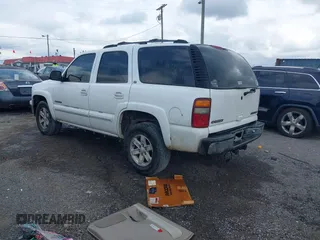 2002 Chevrolet Tahoe LS with VIN 1GNEK13Z22R143490, listed as a IAAI auction lot 42609711 with 323,388 mi miles and . Bid and sale history available at DreamBid. Image 3.
