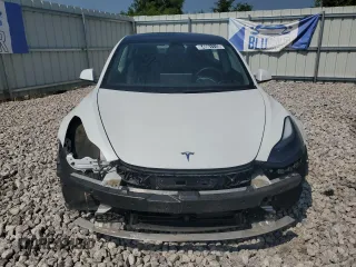 2023 Tesla Model 3 with VIN 5YJ3E1EA8PF449797, listed as a Copart auction lot 64601115 with 99,771 mi miles and Clean title. Bid and sale history available at DreamBid. Image 5.