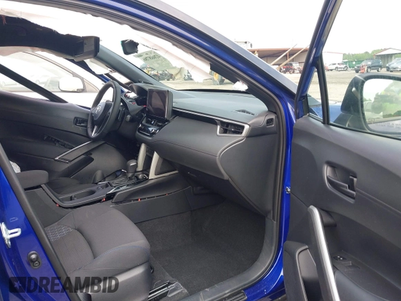 2024 Toyota Corolla Cross Hybrid S with VIN 7MUFBABG2RV042934, listed as a IAAI auction lot 42098911 with 7,613 mi miles and . Bid and sale history available at DreamBid. Image 5.