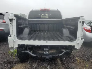 2022 Chevrolet Colorado 4WD Z71 z VIN 1GCGTDEN0N1164190, wystawiony jako Copart lot #57850875 z przebiegiem 18 788 mil mil oraz Szkoda całkowita • Salvage title. Historia ofert i sprzedaży dostępna na DreamBid. Obrazek 6.