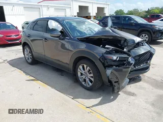 2021 Mazda CX-30 Select with VIN 3MVDMBBL2MM261169, listed as a IAAI auction lot 41938783 with 74,996 mi miles. Bid and sale history available at carsss.com. Image 1.