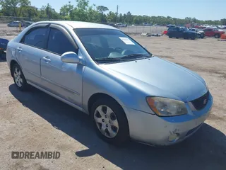2005 Kia Spectra LX with VIN KNAFE121955107403, listed as a IAAI auction lot 42055036 with 157,605 mi miles. Bid and sale history available at carsss.com. Image 1.