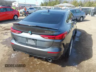 2020 BMW 2 Series 228i xDrive with VIN WBA73AK03L7F73978, listed as a IAAI auction lot 41771031 with 70,198 mi miles. Bid and sale history available at carsss.com. Image 4.