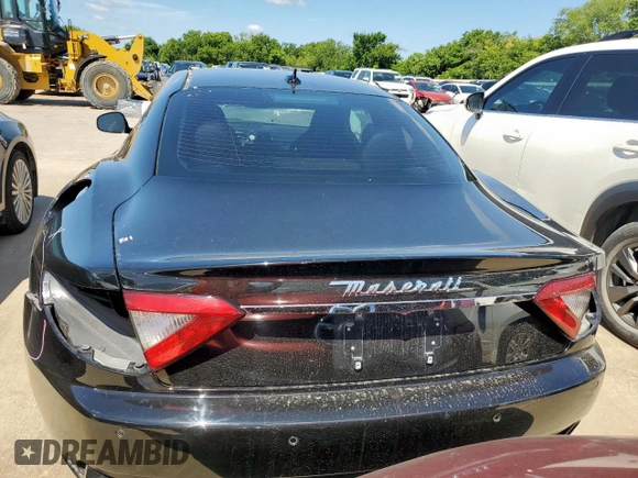 2014 Maserati GranTurismo Sport z VIN ZAM45VLAXE0083282, wystawiony jako Copart lot #61799155 z przebiegiem 71 517 mil mil oraz Szkoda całkowita • Salvage title. Historia ofert i sprzedaży dostępna na DreamBid. Obrazek 6.