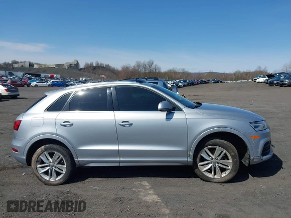 2016 Audi Q3 Premium Plus with VIN WA1EFCFS1GR016996, listed as a IAAI auction lot 41942380 with 90,852 mi miles and . Bid and sale history available at DreamBid. Image 13.