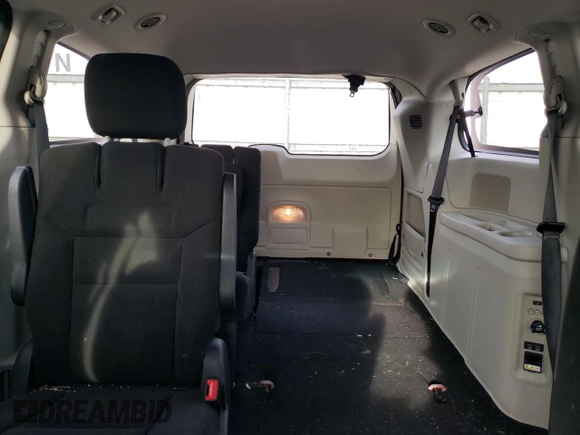 2015 Dodge Grand Caravan SXT with VIN 2C4RDGCG3FR625083, listed as a Copart auction lot 42409455 with 117,217 mi miles and Salvage Title. Bid and sale history available at DreamBid. Image 10.