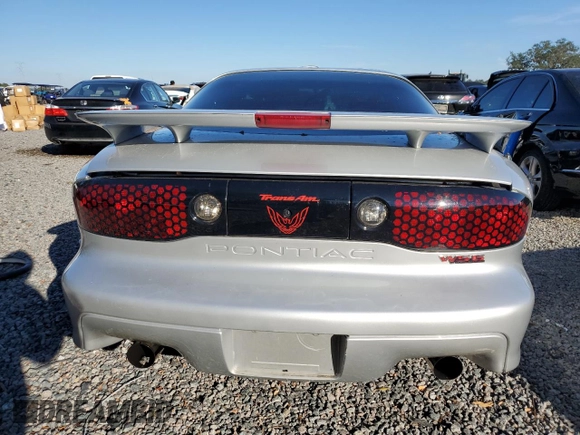 2002 Pontiac Firebird Formula z VIN 2G2FV22G822152907, wystawiony jako Copart lot #87459634 z przebiegiem 64 858 mil mil oraz Szkody całkowita. Historia ofert i sprzedaży dostępna na DreamBid. Obrazek 6.