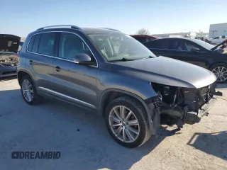 2012 Volkswagen Tiguan SE with VIN WVGAV7AX8CW080123, listed as a Copart auction lot 88922235 with 159,093 mi miles and Salvage Title. Bid and sale history available at DreamBid. Image 4.