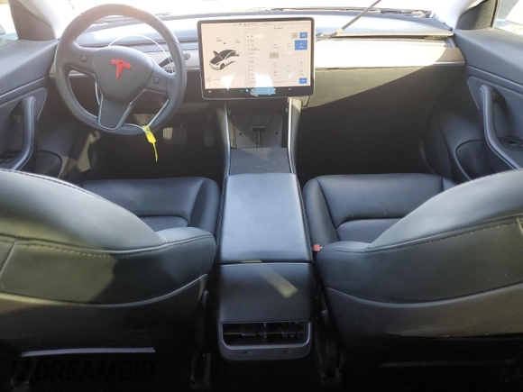 2020 Tesla Model 3 Long Range with VIN 5YJ3E1EB0LF665887, listed as a Copart auction lot 48985245 with 50,309 mi miles and Salvage Title. Bid and sale history available at DreamBid. Image 8.