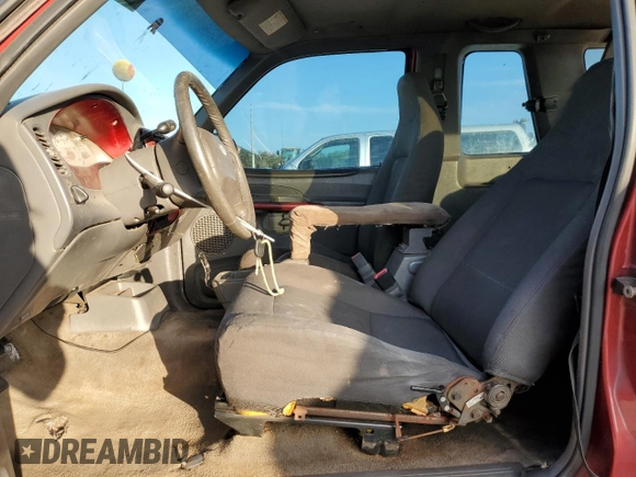 2002 Ford Explorer Sport Value z VIN 1FMYU60E92UD69601, wystawiony jako Copart lot #88303645 z przebiegiem 223 132 mil mil oraz Szkoda całkowita • Salvage title. Historia ofert i sprzedaży dostępna na DreamBid. Obrazek 7.