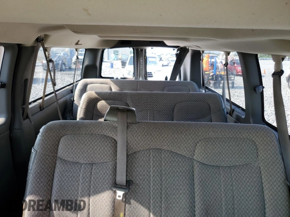 2004 Chevrolet Express Passenger with VIN 1GAHG39U741128458, listed as a Copart auction lot 64436215 with 118,387 mi miles and Salvage title. Bid and sale history available at DreamBid. Image 10.