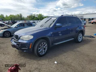 2012 BMW X5 35i with VIN 5UXZV4C56CL754643, listed as a Copart auction lot 55970125 with 150,584 mi miles and Salvage title. Bid and sale history available at DreamBid. Image 1.