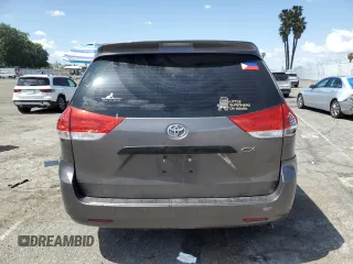 2014 Toyota Sienna L z VIN 5TDZK3DC0ES409479, wystawiony jako Copart lot #51643485 z przebiegiem 119 709 mil mil oraz Szkoda całkowita • Salvage title. Historia ofert i sprzedaży dostępna na DreamBid. Obrazek 6.