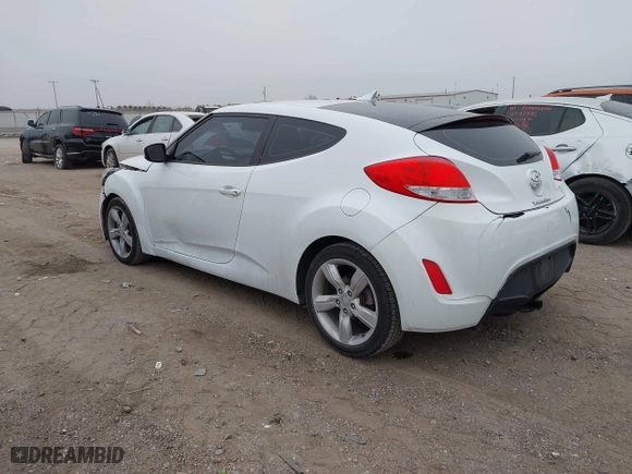 2014 Hyundai Veloster with VIN KMHTC6AD6EU211479, listed as a IAAI auction lot 41196275 with 132,337 mi miles. Bid and sale history available at carsss.com. Image 3.