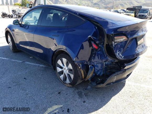 2022 Tesla Model Y Long Range with VIN 7SAYGAEE1NF365744, listed as a Copart auction lot 46280125 with 78,545 mi miles and Salvage Title. Bid and sale history available at carsss.com. Image 2.
