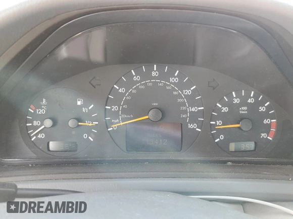 2000 Mercedes-Benz CLK 320/430 with VIN WDBLJ65G9YF132328, listed as a Copart auction lot 71779694 with 113,412 mi miles and Salvage Title. Bid and sale history available at DreamBid. Image 9.