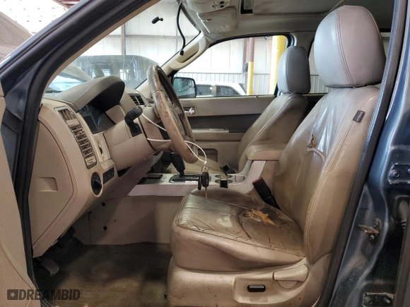 2010 Mercury Mariner Premier with VIN 4M2CN9HG0AKJ26413, listed as a Copart auction lot 72378324 with 191,647 mi miles and Salvage Title. Bid and sale history available at carsss.com. Image 7.