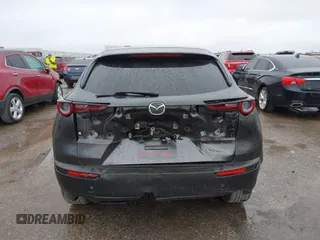 2021 Mazda CX-30 Select with VIN 3MVDMABL9MM272440, listed as a IAAI auction lot 41538691 with 55,069 mi miles and . Bid and sale history available at carsss.com. Image 17.