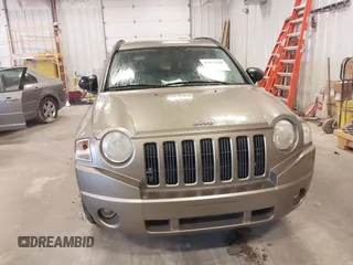 2007 Jeep Compass Sport with VIN 1J8FT47W27D221825, listed as a IAAI auction lot 41977430 with 113,445 mi miles. Bid and sale history available at carsss.com. Image 6.