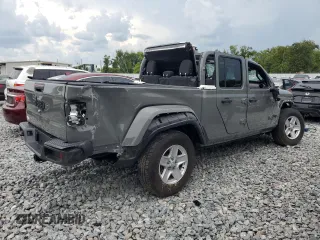2023 Jeep Gladiator Sport S z VIN 1C6HJTAG9PL506729, wystawiony jako Copart lot #58372235 z przebiegiem 52 633 mil mil oraz Nie do naprawy • Non repairable. Historia ofert i sprzedaży dostępna na DreamBid. Obrazek 3.