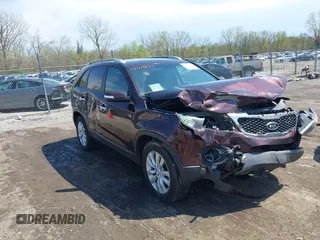 2011 Kia Sorento EX with VIN 5XYKU4A18BG143898, listed as a IAAI auction lot 42103843 with 160,897 mi miles and . Bid and sale history available at DreamBid. Image 1.