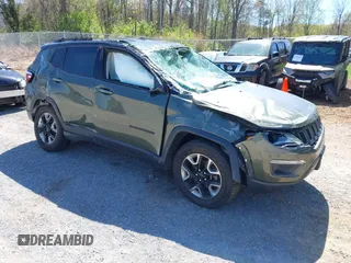 2018 Jeep Compass Trailhawk z VIN 3C4NJDDB0JT241163, wystawiony jako IAAI lot #41986193 z przebiegiem 89 246 mil mil oraz . Historia ofert i sprzedaży dostępna na DreamBid. Obrazek 1.