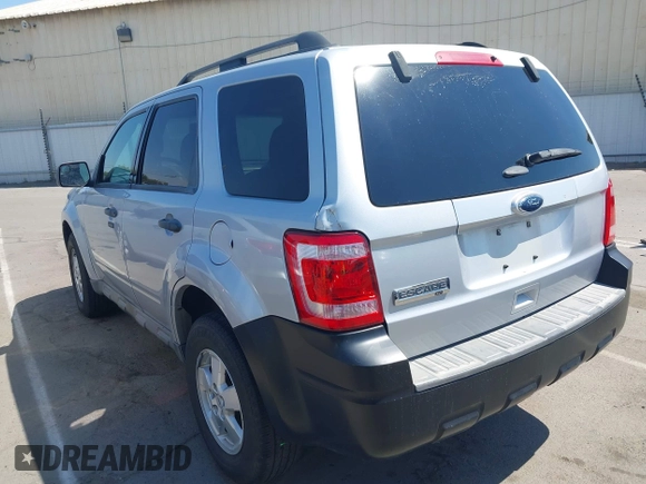 2011 Ford Escape XLT with VIN 1FMCU9D78BKC38601, listed as a IAAI auction lot 42784452 with 173,678 mi miles and . Bid and sale history available at DreamBid. Image 3.
