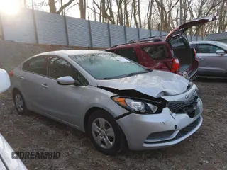 2015 Kia Forte LX with VIN KNAFX4A62F5386526, listed as a IAAI auction lot 41800783 with 124,553 mi miles. Bid and sale history available at carsss.com. Image 1.