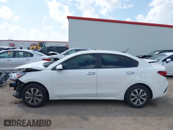 2023 Kia Rio S z VIN 3KPA24AD7PE550899, wystawiony jako IAAI lot #41882407 z przebiegiem 24 966 mil mil oraz . Historia ofert i sprzedaży dostępna na DreamBid. Obrazek 14.