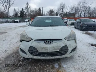 2013 Hyundai Veloster w/Black Int with VIN KMHTC6AD9DU171722, listed as a IAAI auction lot 41617721 with 115,791 mi miles and . Bid and sale history available at DreamBid. Image 12.