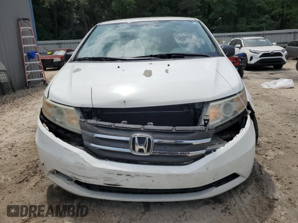 2013 Honda Odyssey EX z VIN 5FNRL5H43DB055987, wystawiony jako Copart lot #54001985 z przebiegiem 162 448 mil mil oraz Szkody całkowita. Historia ofert i sprzedaży dostępna na DreamBid. Obrazek 5.