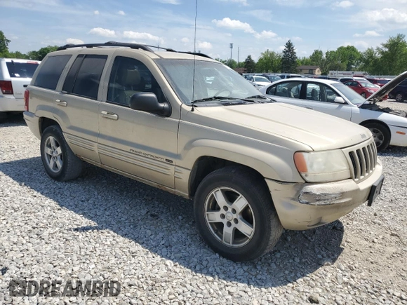 2000 Jeep Grand Cherokee Limited z VIN 1J4GW58N0YC272532, wystawiony jako Copart lot #57524225 z przebiegiem 238 921 mil mil oraz Szkoda całkowita • Salvage title. Historia ofert i sprzedaży dostępna na DreamBid. Obrazek 4.