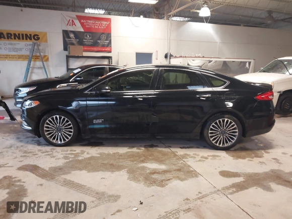 2017 Ford Fusion Titanium с VIN 3FA6P0SU8HR215570, выставлен на аукционе IAAI как лот 41427407 с пробегом 97 281 миль миль и . История ставок и продаж доступна на DreamBid. Изображение 14.