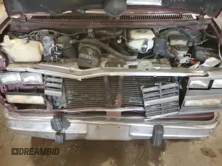 1992 Chevrolet Chevy Van z VIN 2GBEG25K3N4150299, wystawiony jako Copart lot #74099444 z przebiegiem 156 341 mil mil oraz Tytuł czysty. Historia ofert i sprzedaży dostępna na DreamBid. Obrazek 12.