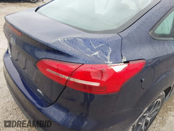 2017 Ford Focus SEL with VIN 1FADP3H29HL312631, listed as a IAAI auction lot 41226591 with 133,814 mi miles. Bid and sale history available at carsss.com. Image 21.