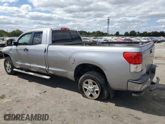 2012 Toyota Tundra 4WD Truck with VIN 5TFCY5F15CX013941, listed as a Copart auction lot 69946754 with 163,228 mi miles and Salvage Title. Bid and sale history available at carsss.com. Image 2.