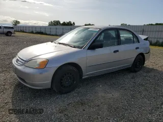 2001 Honda Civic LX with VIN JHMES15501S001759, listed as a Copart auction lot 51538465 with 312,818 mi miles and Salvage Title. Bid and sale history available at carsss.com. Image 1.