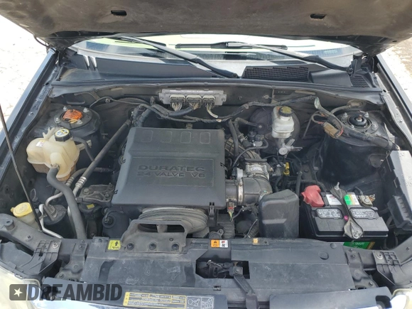 2010 Ford Escape Limited with VIN 1FMCU9EG9AKD10497, listed as a Copart auction lot 57817504 with 185,748 mi miles and Salvage title. Bid and sale history available at DreamBid. Image 12.