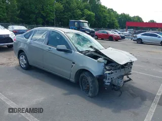 2008 Ford Focus SE with VIN 1FAHP35N68W198442, listed as a IAAI auction lot 39509774 with 180,247 mi miles. Bid and sale history available at carsss.com. Image 1.
