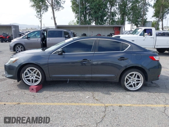 2016 Acura ILX Premium z VIN 19UDE2F76GA013196, wystawiony jako IAAI lot #42216841 z przebiegiem 73 867 mil mil oraz . Historia ofert i sprzedaży dostępna na DreamBid. Obrazek 14.