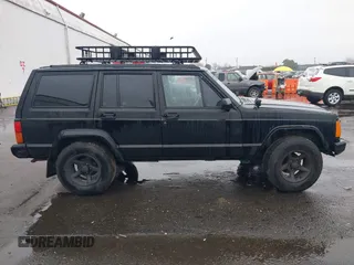 1996 Jeep Cherokee SE with VIN 1J4FJ28S9TL135564, listed as a IAAI auction lot 41618367 with 249,410 mi miles and . Bid and sale history available at DreamBid. Image 13.
