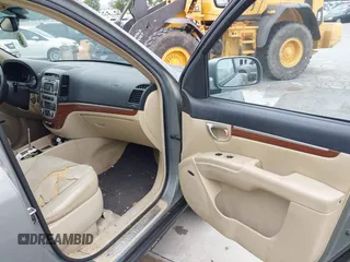 2009 Hyundai Santa Fe SE z VIN 5NMSH13E79H269284, wystawiony jako IAAI lot #42405821 z przebiegiem 197 413 mil mil oraz . Historia ofert i sprzedaży dostępna na DreamBid. Obrazek 5.