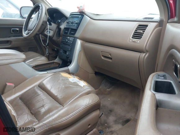 2006 Honda Pilot EX-L with RES with VIN 5FNYF18626B022642, listed as a IAAI auction lot 41115722 with 283,756 mi miles. Bid and sale history available at carsss.com. Image 5.