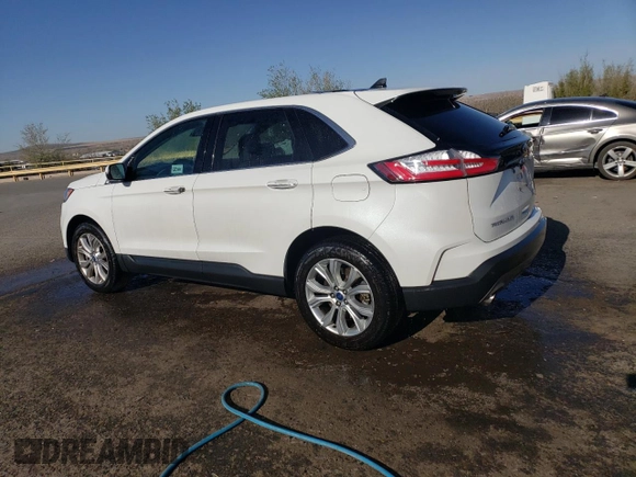 2021 Ford Edge Titanium with VIN 2FMPK4K91MBA27073, listed as a Copart auction lot 51776575 with 113,559 mi miles and Clean title. Bid and sale history available at DreamBid. Image 2.