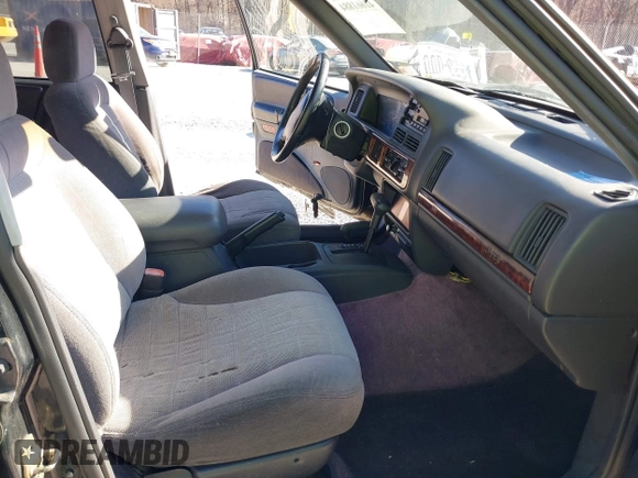 1996 Jeep Grand Cherokee Laredo with VIN 1J4GZ58S3TC345107, listed as a IAAI auction lot 41661884 with 179,175 mi miles. Bid and sale history available at carsss.com. Image 5.