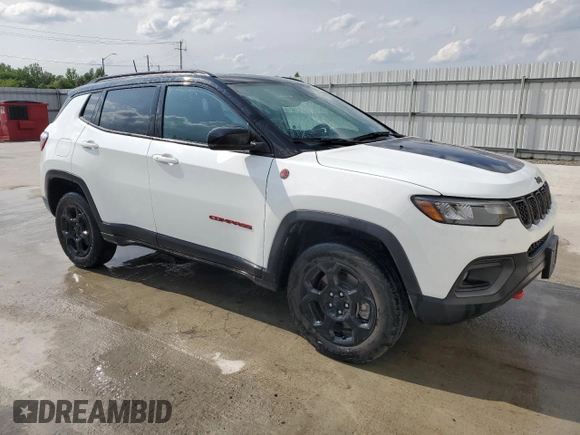 2023 Jeep Compass Trailhawk with VIN 3C4NJDDN5PT567737, listed as a Copart auction lot 61824665 with 43,843 mi miles and Clean title. Bid and sale history available at DreamBid. Image 4.