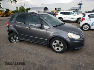 2013 Suzuki SX4 Crossover with VIN JS2YB5A36D6101183, listed as a Copart auction lot 67443314 with 122,483 mi miles and Salvage Title. Bid and sale history available at DreamBid. Image 4.