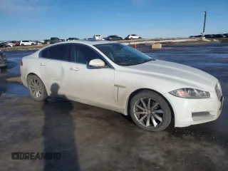 2015 Jaguar XF with VIN SAJXA0FS5FPU49437, listed as a Copart auction lot 84757254 with 99,301 mi miles and Salvage Title. Bid and sale history available at DreamBid. Image 4.