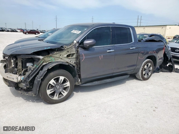 2019 Honda Ridgeline RTL-E with VIN 5FPYK3F71KB021020, listed as a Copart auction lot 52617435 with 75,399 mi miles and Salvage Title. Bid and sale history available at carsss.com. Image 1.