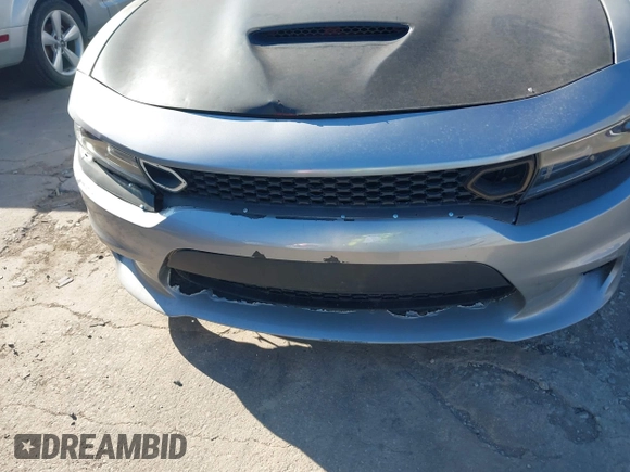 2015 Dodge Charger SXT with VIN 2C3CDXHG8FH884080, listed as a IAAI auction lot 42230385 with 151,948 mi miles and . Bid and sale history available at DreamBid. Image 6.